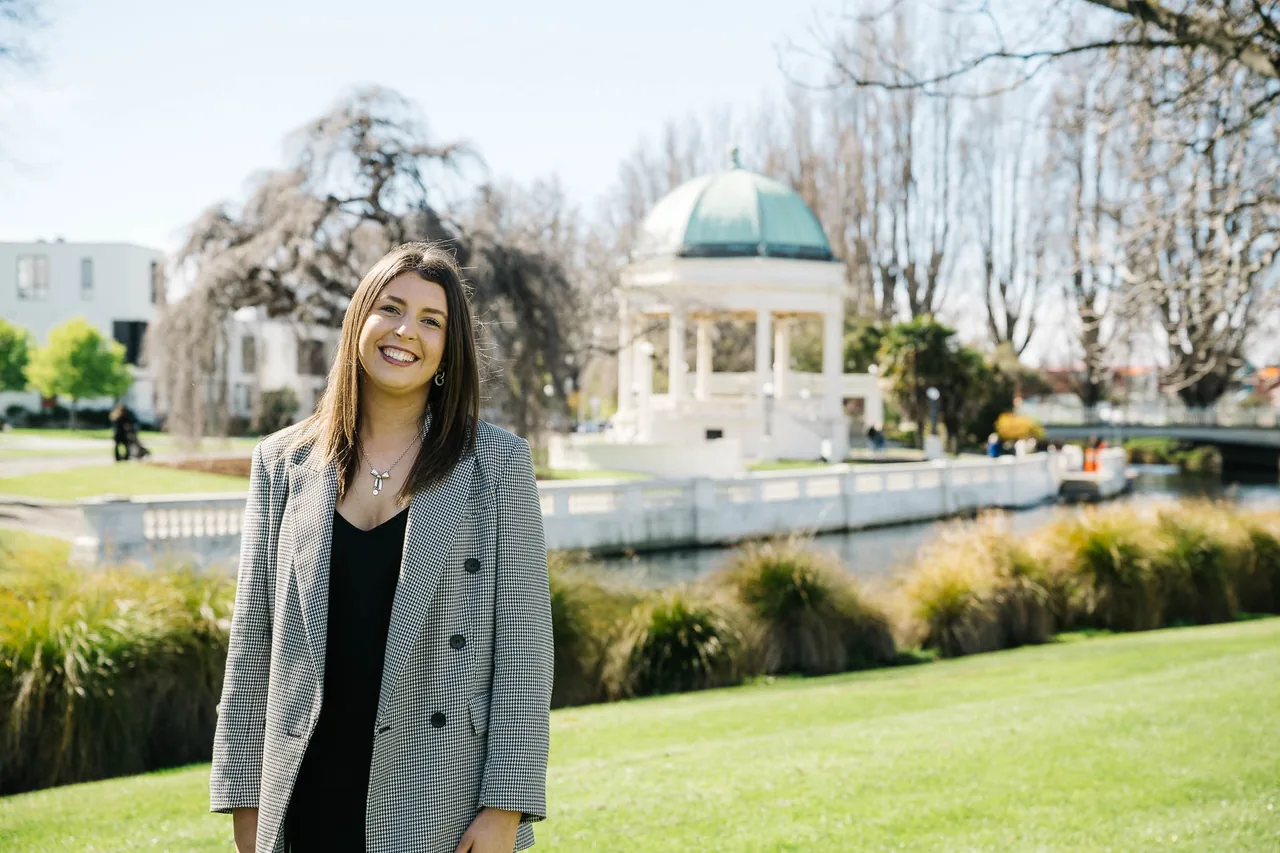 Ella Shanks, Adviser Support, in a Christchurch riverside park